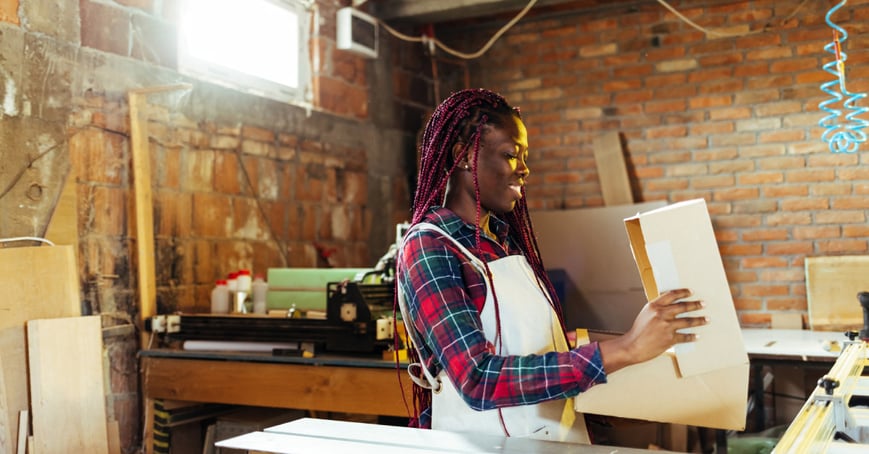 Business owner using credit card to purchase company supplies