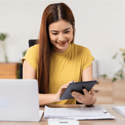 Woman calculating balance transfer