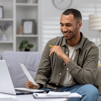 Young Man reviewing his finances