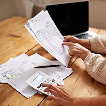 couple budgeting at a table