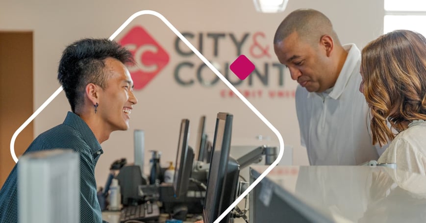 City & County Credit Union employee talking to members