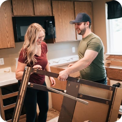 Couple renovating kitchen