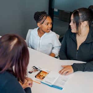 Mother and daughter talking at CCCU Branch