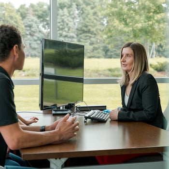 CCCU consultation with employee and member at desk