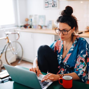 Woman relaxing on laptop