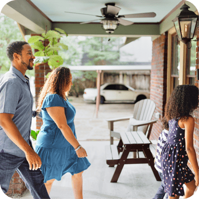 Family arriving on front porch