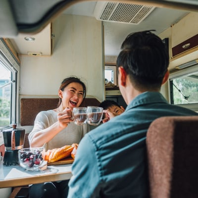 Family eating breakfast in RV