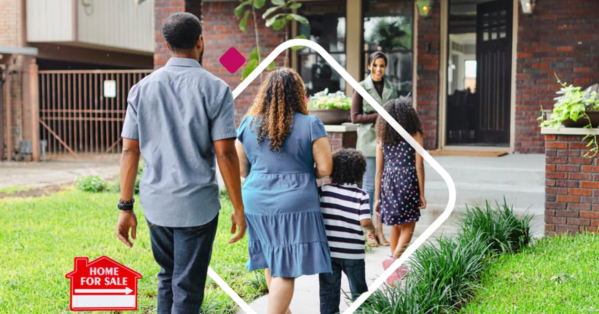 Family walking into new home
