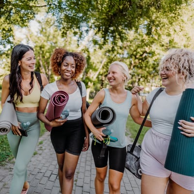 Friends walking to yoga