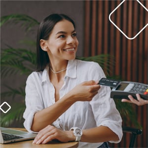 woman paying with credit card